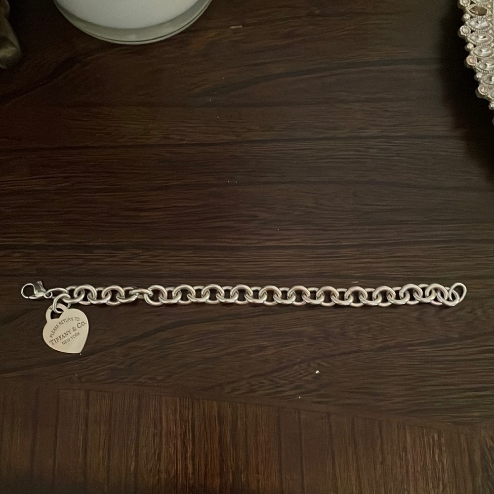 Tiffany & Co., 925 sterling silver charm bracelet. Gently used.